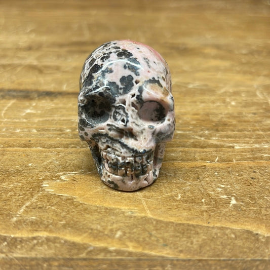 Rhodochrosite 1in Skull